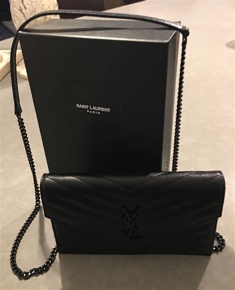 how can you tell if a ysl wallet is real|ysl wallet on chain.